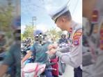 Satlantas-Polres-Kotabaru-sodorkan-asbak.jpg