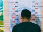 Satu-dari-empat-tersangka-yang-diamankan-polisi-di-Mako-Polres-Bontang.jpg