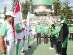 Sekda-Tanbu-H-Ambo-Sakka-menerima-api-obor-Porprov-Kalsel-Kamis-03112022.jpg