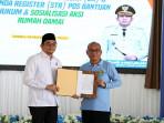 Serah-terima-SK-dan-Surat-Tanda-Register-STR-Posbakum.jpg