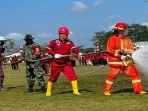 Simulasi-pemadaman-lahan-terbakar-oleh-personil-TNI-Polri.jpg