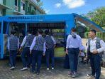 Siswa-SMA-GIBS-ramai-menyambut-kedatangan-Pusling-Palnam.jpg