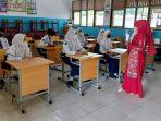 Siswa-kelas-7-SMP-Negeri-9-Banjarmasin-saat-pembelajaran.jpg