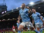 Striker-Manchester-City-Erling-Haaland-merayakan-setelah-mencetak-gol-pembuka-dari-titik-penalti.jpg