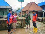 Suasana-Tim-BPBD-peninjauan-ke-lokasi-genangan-air-ketika-air-sungai-Meluap.jpg