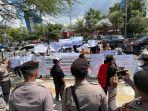 Suasana-aksi-yang-dilakukan-oleh-Koalisi-Masyarakat-Perdulid.jpg
