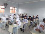 Suasana-ujian-kenaikan-kelas-siswa-di-SMKN-2-Banjarmasin-Kalimantan-Selatan-13062022.jpg
