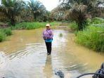 Sungai-Selilau-meluap-rendam-jalan-tani-hingga-kebun-milik-warga.jpg