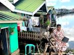 TITIAN-Warga-terdampak-ambruknya-jalan-utama-Kampung-Hijau-Banjarmasin-1.jpg