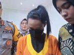 Tersangka-YR-saat-digiring-petugas-ke-Mapolda-Kaltim-1.jpg