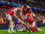 Tiga-pemain-andalan-Arsenal-William-Saliba-Gabriel-Magalhães-dan-Bukayo-Saka.jpg