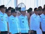 Wakil-Bupati-HSS-Suriani-topi-putih-saat-mengikuti-apel-Kesiapsiagaan.jpg