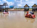 Wisata-Kalsel-Wahana-sepeda-air-Jejangkit-Ecopark-Kabupaten-Barito-Kuala-Batola-14112022.jpg