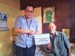 Yusran-65menerima-bantuan-dari-UPZ-Bank-Kalsel-ddd.jpg