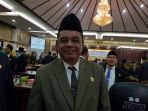 ahmad-rozi-anggota-kpu-kabupaten-tanahlaut_20180906_174827.jpg