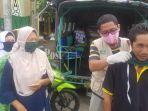 aksi-bagi-masker-satgas-peduli-covid-19-nu-di-pasar-miawa-tapin-kalsel-selasa-2142020.jpg
