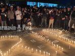 aksi-solidaritas-di-depan-Stadion-17-Mei-Kota-Banjarmasin-atas-tragedi-kanjuruhan-Senin-0310022.jpg