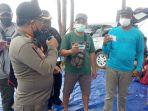 anggota-satpol-pp-kabupaten-tanbu-berikan-imbauan-kepada-pengunjung-tempat-wisata.jpg