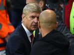 arsene-wenger-tampak-berdebat-dengan-pep-guardiola_20180302_072710.jpg