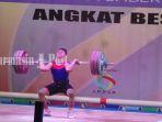 atlet-angkat-besi-kalsel-misbah-saat-diajang-popnas-di-jakarta.jpg