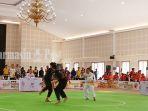 atlet-pencak-silat-Kalsel-Resky-Alfi-Sahri-vs-Ahmad-Arjun-Firdaus-dari-kalteng-di-Pra-Popnas.jpg