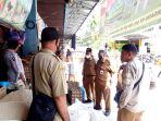 bagian-ekonomi-setda-dan-disperindagkop-melakukan-pengecekan-harga-jelang-nataru.jpg