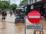banjir-di-kalsel-satu-kawasan-yang-terendam-di-kota-kandangan-senin-07022022.jpg