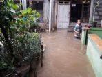 banjir-di-pinggiran-ciliwung-jakarta_20180205_180617.jpg