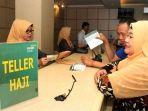 bank-mandiri-syariah-melayani-calon-jemaah-haji-melakukan-pelunasan-biaya-ibadah-haj.jpg