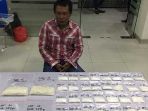 barang-bukti-bubuk-cocaine-seberat-201425-gram_20180325_090710.jpg