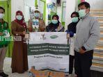 baznas-kota-banjarmasin-beri-bantuan-untuk-tenaga-kesehatan-kamis-3042020.jpg
