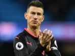 bek-sekaligus-kapten-arsenal-laurent-koscielny_20180306_061929.jpg