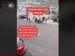 beredar-video-aksi-tukang-parkir-menyelamatkan-dua-wanita-yang-berbocengan-dan-membawa-anak01.jpg