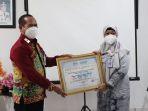 bpsmb-disdag-kalsel-terima-sertifikat-dari-komite-akreditasi-nasional-kan-lab-iso-sni.jpg