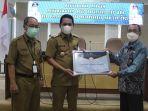 bupati-balangan-abdul-hadi-menerima-penghargaan-atas-fasilitas-cat-bkn.jpg