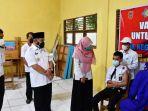 bupati-hss-achmad-fikry-meninjau-vaksinasi-covid-19-untuk-pelajar-di-smkn-1-loksado-29092021.jpg