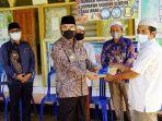 bupati-hss-h-achmad-fikry-berikan-sumbangan.jpg