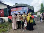 bupati-hsu-dan-ketua-dprd-hsu-menyalurkan-hak-suara-di-tps-04-desa-kota-raja.jpg
