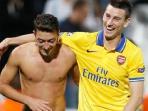 dua-pemain-arsenal-mesut-oezil-dan-laurent-koscielny_20160707_183336.jpg