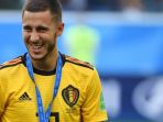 eden-hazard-berpose-dengan-medali-setelah-membantu-belgia_20180717_054216.jpg