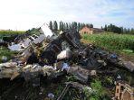 gambar-yang-diambil-pada-19-juli-2014-memperlihatkan-puing-malaysia-airlines-mh17.jpg