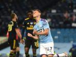 gelandang-manchester-city-phil-foden-berselebrasi-usai-mencetak-gol.jpg