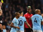 gelandang-manchester-united-paul-pogba-menerima-kartu-kuning_20180410_062925.jpg