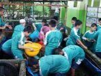 gotong-royong-bersih-bersih-lingkungan-sekolah.jpg
