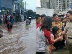 gubernur-anies-baswedan-sebut-anak-anak-senang-bermain-di-luapan-air-banjir-jakarta.jpg