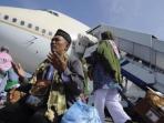 ilustrasi-rombongan-haji-indonesia-setibanya-di-tanah-air_20150531_104446.jpg