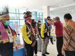 jajaran-dispora-kalsel-dan-banjarbaru-menyambut-atlet-pon-xx-papua-di-bandara-syamsudin-noor.jpg