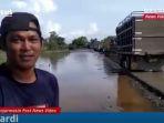 jalan-gubernur-syarkawi-sungai-tabuk-kabupaten-banjar-provinsi-kalsel-selasa-26012021.jpg