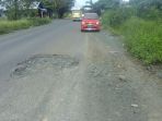 jalan-transmigrasi-rusak_20170301_164122.jpg