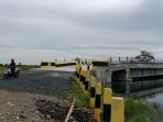jembatan-guntung-manggis-yang-dibangun-dengan-anggaran-2017-lalu-telah-selesai_20180319_203020.jpg